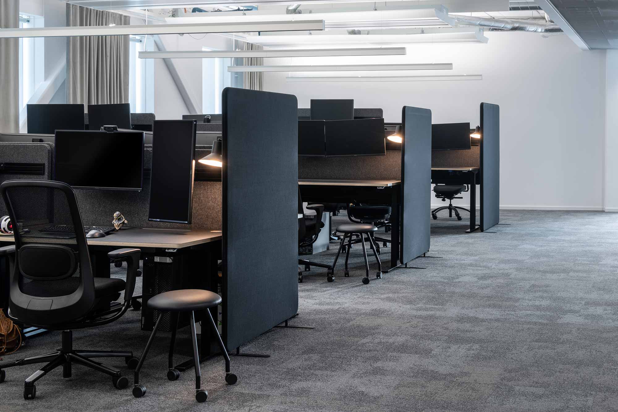 office cubicles at goodbye kansas with black HÅG Sofi mesh chairs