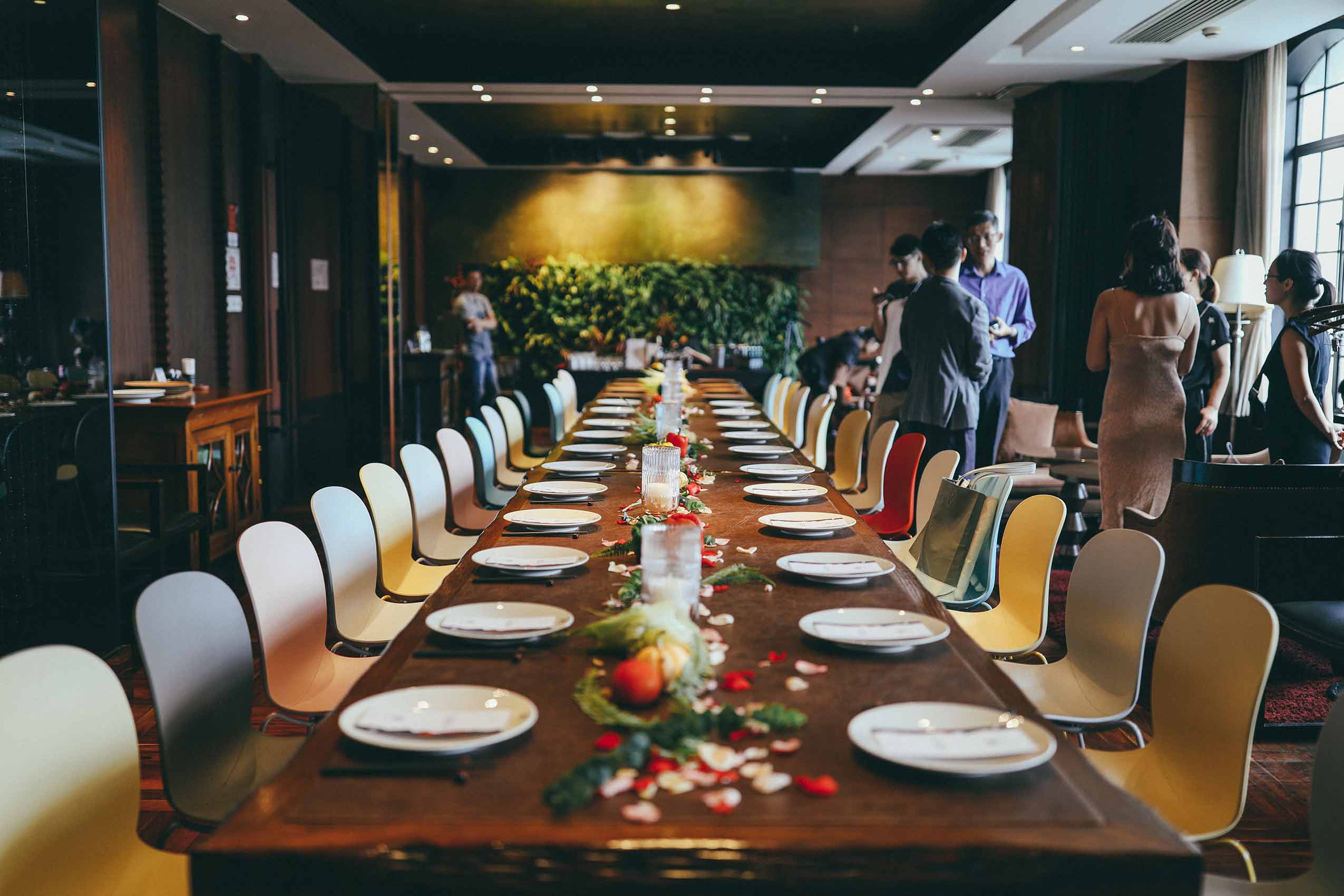 RBM Noor chairs with sledge base around a wooden table in Shanghai restaurant