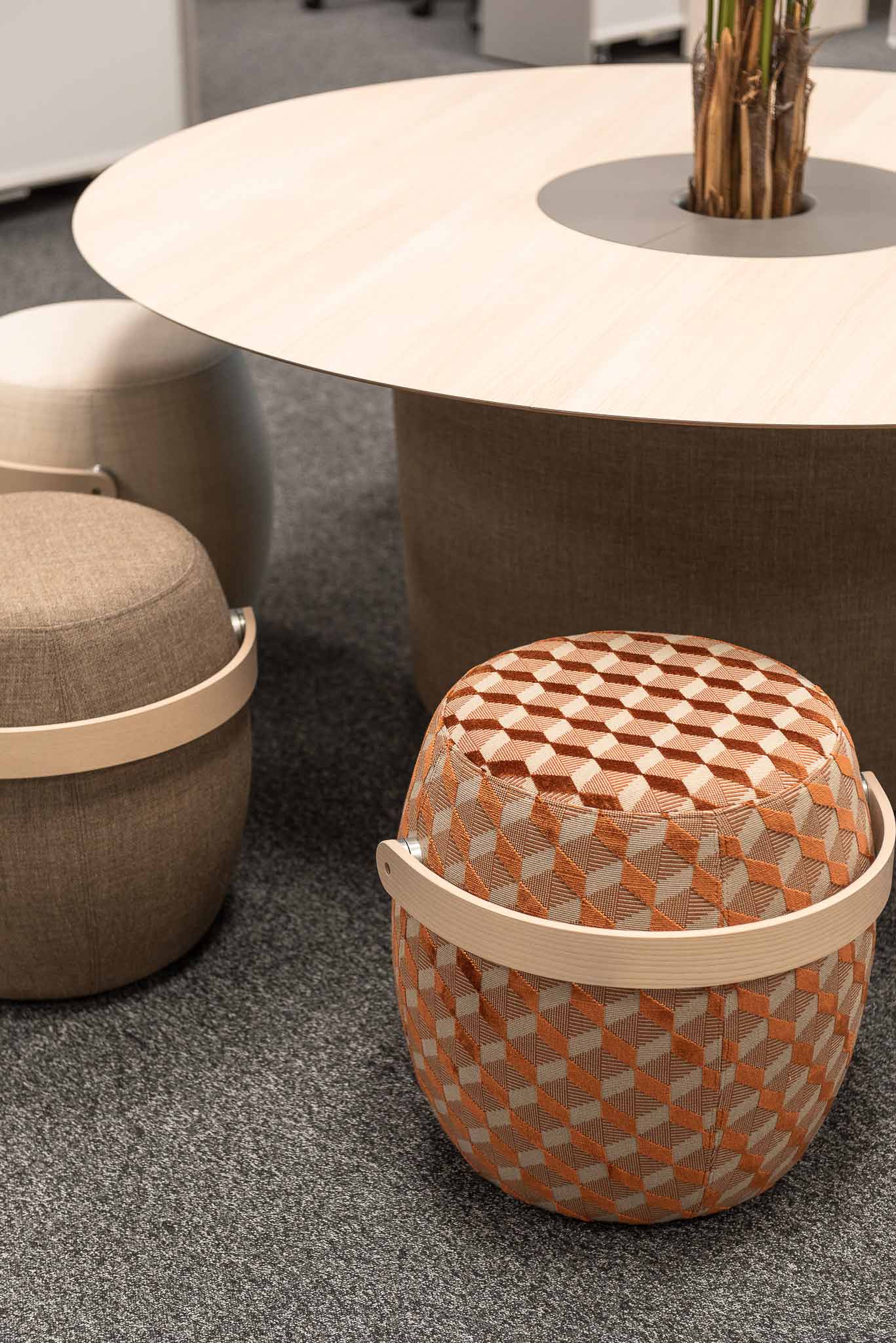 close up of Offecct Carry on stools and Offecct On Point Table