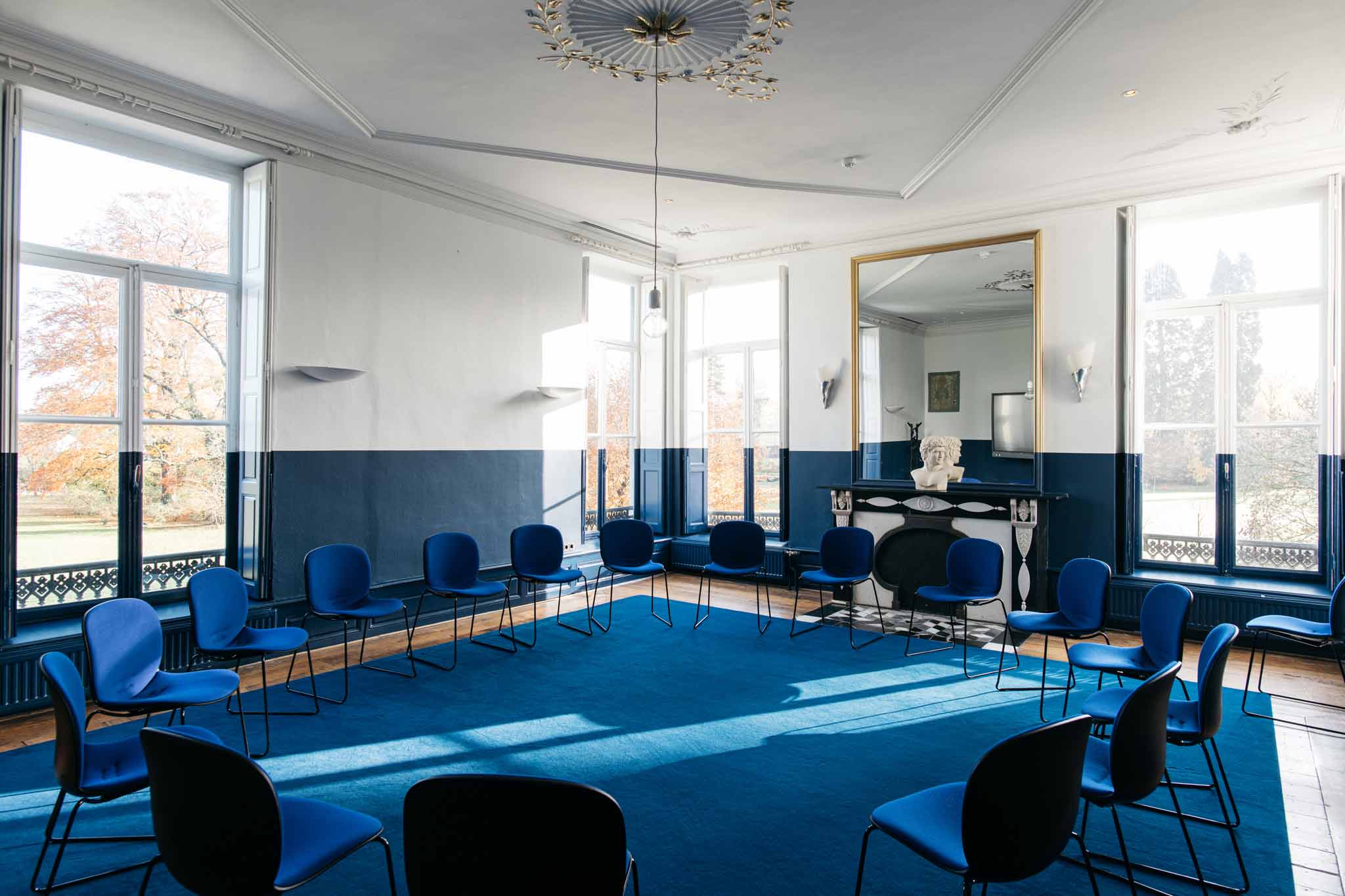 Blue RBM Noor chairs in meeting room at Vaeshartelt hotel in Netherlands