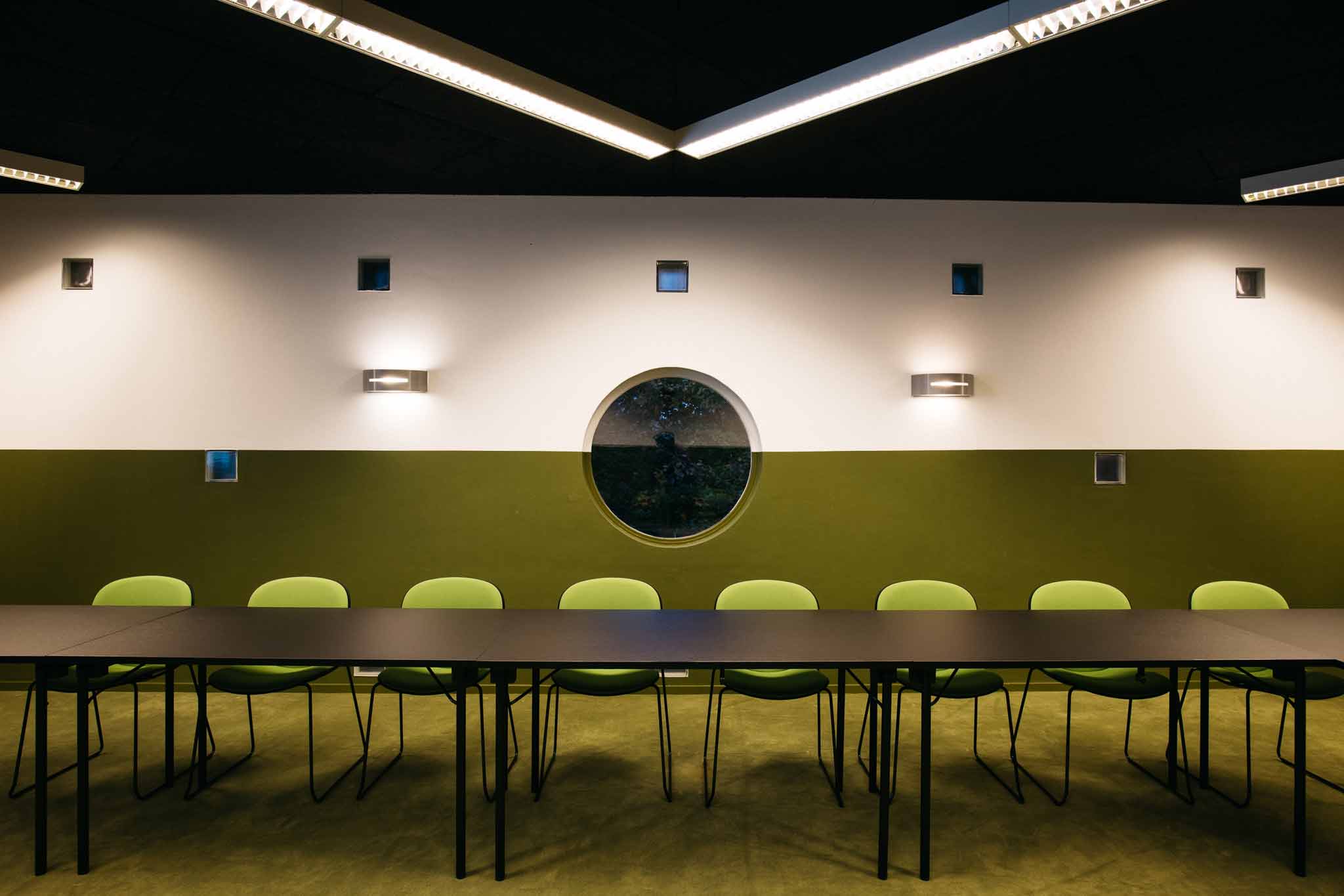 Green RBM Noor chairs in Gabriel fabric in meeting room at Vaeshartelt hotel in Maastricht